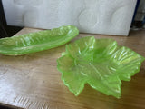 2 Trays, 1 Is a 9 inch feather, the other is a 6 inch leaf in various colors,
