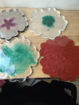 4 resin coasters with Nice design.