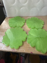 4 resin coasters with Nice design.