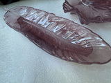 2 Trays, 1 Is a 9 inch feather, the other is a 6 inch leaf in various colors,
